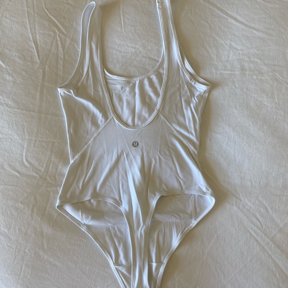 Lululemon white thing body suit size 4